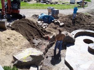 Montana Landscape Construction - fire pit and boulders